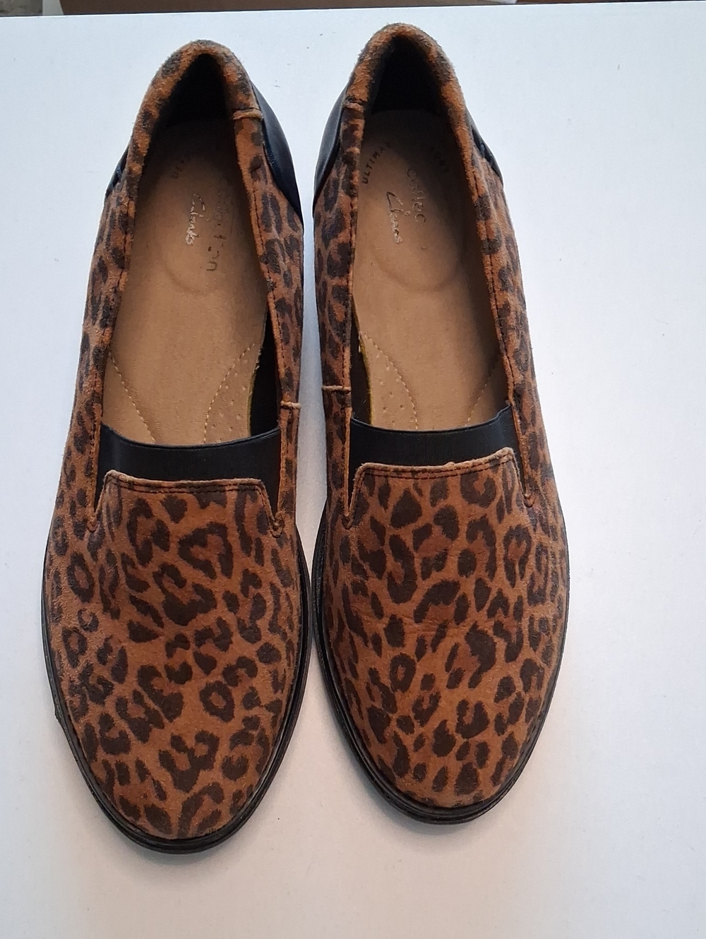Clarks Leopard-Print Slip-On Flats in Brown and Black